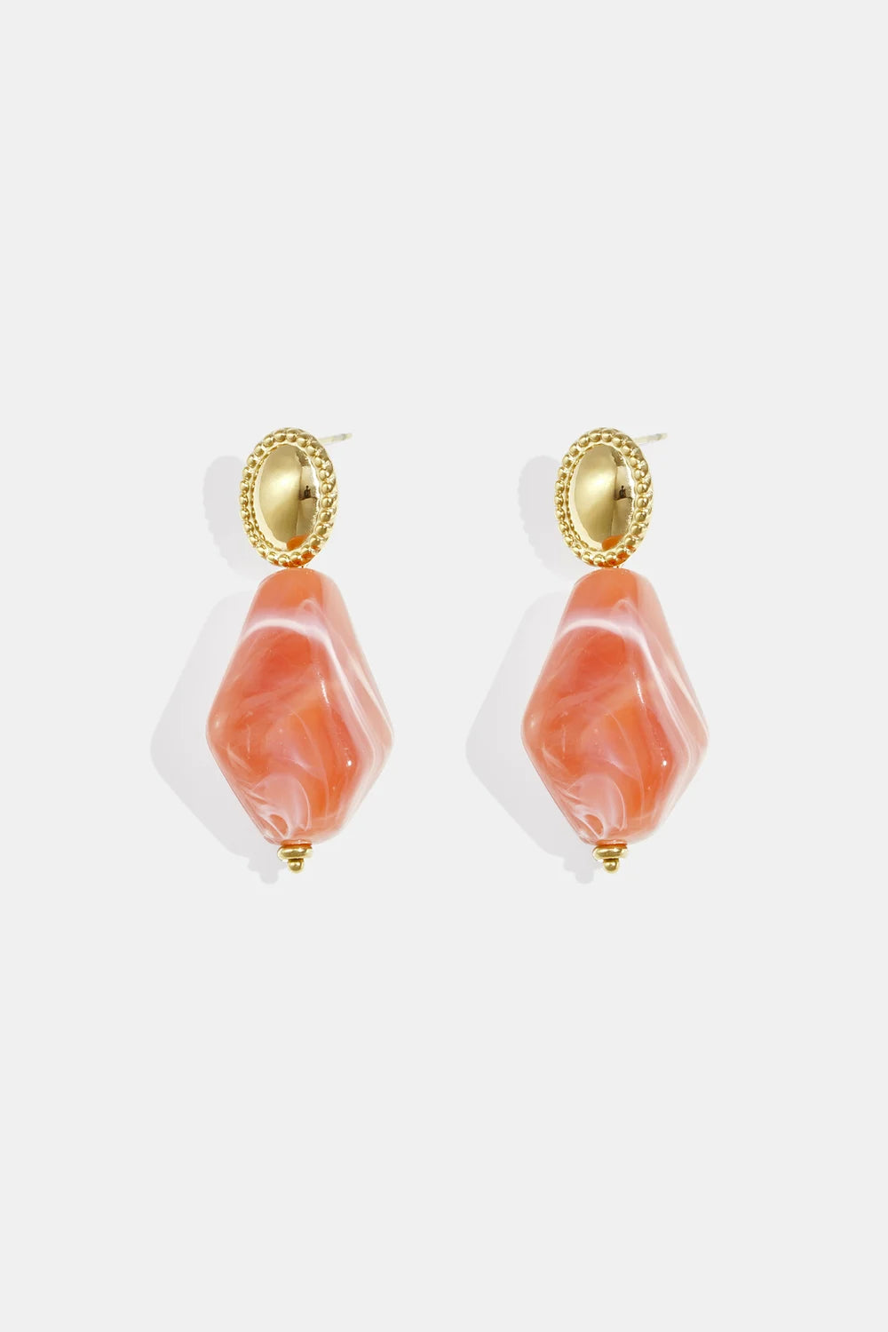 Statement oorbellen – marmerlook perzik 🧡