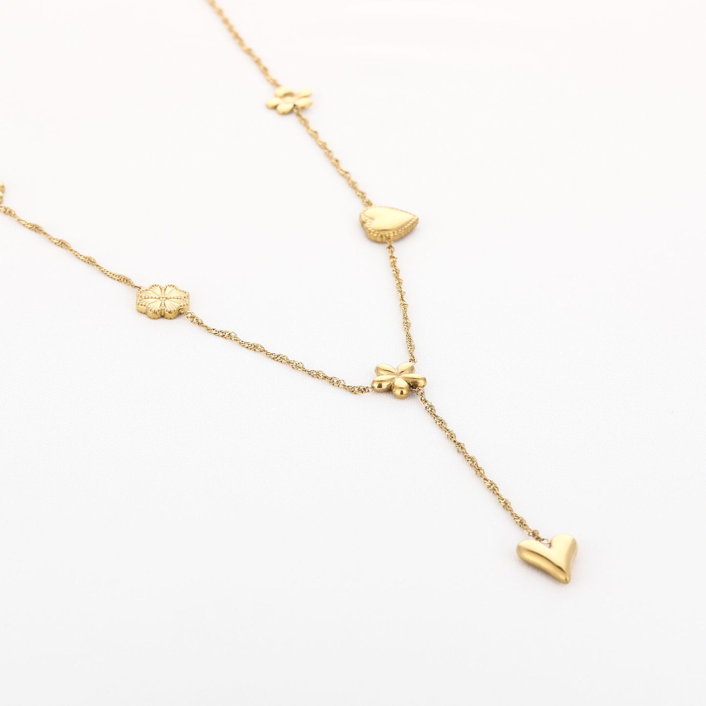 Y-ketting met hartje & bloemen – goudkleurig